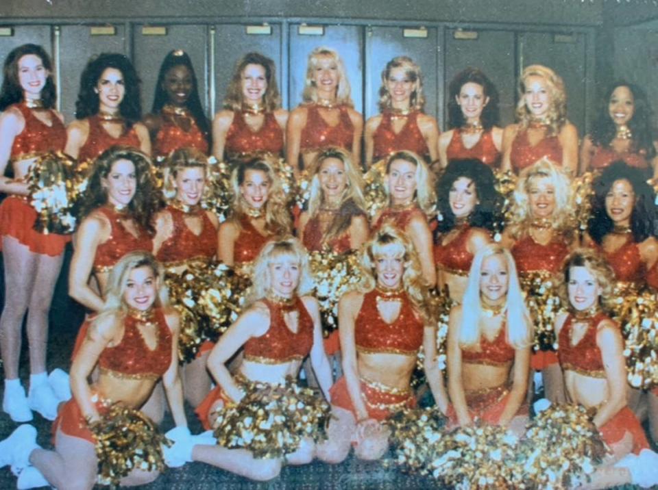 The 1996-1997 Chiefs cheerleaders pose, Manley in the second row, second from the right.