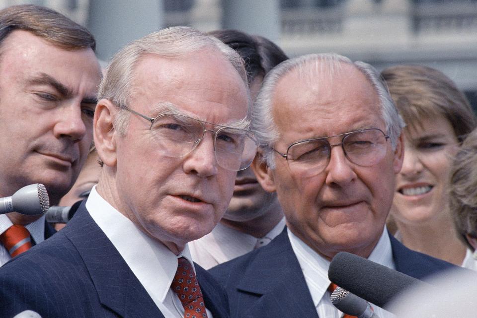 House Speaker Jim Wright, D-Texas, looking at the camera, and House Republican leader Robert Michel of Illinois in Washington, D.C., on Aug. 5, 1987.