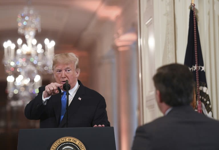 The White House had suspended Acosta's hard pass after he sparred at a news conference with the president