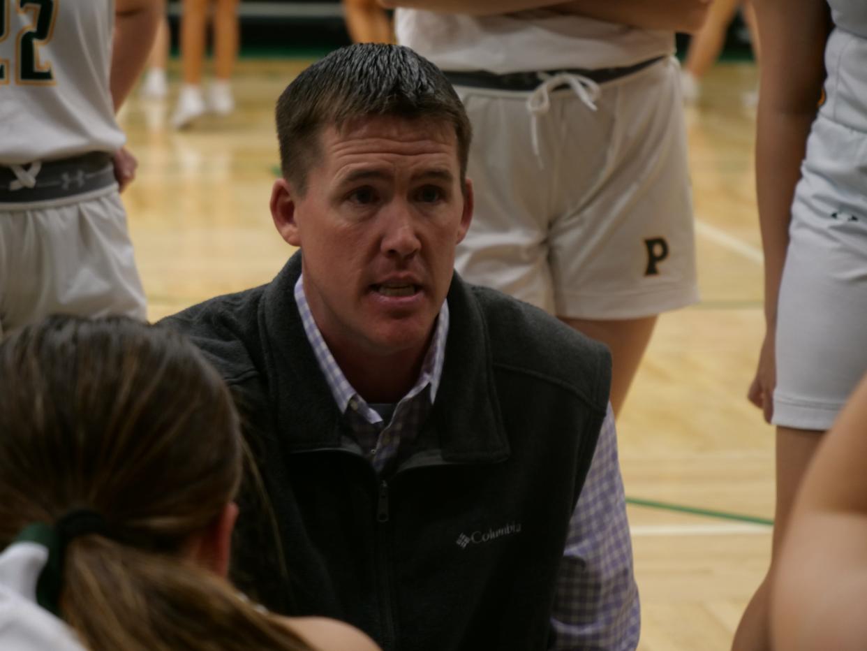 Pampa girls basketball head coach Clint Watson talks to his team during a timeout against Hereford on Wednesday, January 25, 2023 at Pampa High School.