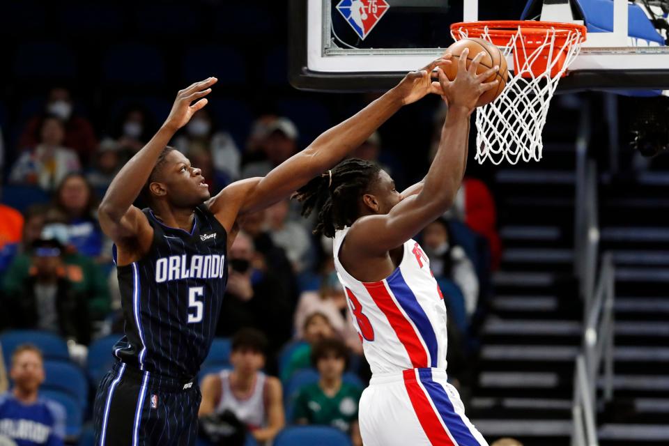 Orlando Magic center Mo Bamba (5) blocks the shot of Detroit Pistons center Isaiah Stewart during the first half of an NBA basketball game Friday, Jan. 28, 2022, in Orlando, Fla.