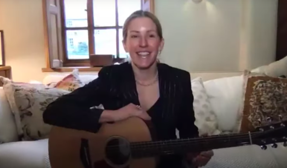 The star performed her hit Love Me Like You Do with a guitar on her sofa at home (For Better For Worse)