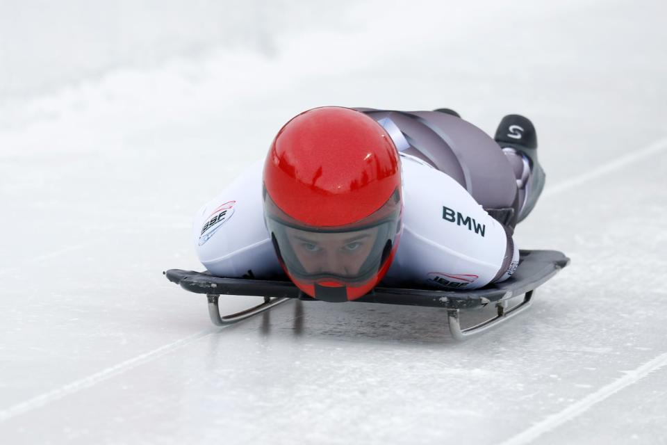 Canada's Hallie Clarke, seen above in 2022, sits in first place through two heats of the women's skeleton event at the world championships in Winterberg, Germany. (Jeff Swinger/The Associated Press - image credit)