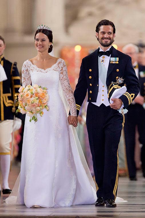 <p>Sofia Hellqvist wore an Ida Sjöstedt dress decorated with handmade lace when she wed Prince Carl Philip of Sweden.</p>