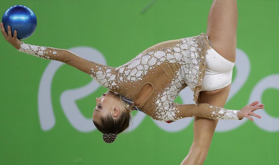 <p>Belarus’ Melitina Staniouta performs during the rhythmic gymnastics individual all-around qualifications at the 2016 Summer Olympics in Rio de Janeiro, Brazil, Friday, Aug. 19, 2016. (AP) </p>