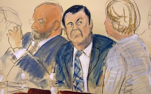 Courtroom sketch of Joaquin "El Chapo" Guzman, center, sitting next to his defence team - Credit: AP