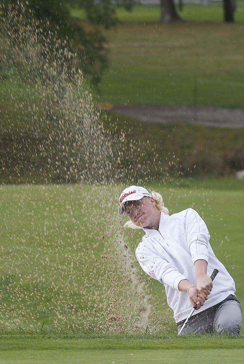 Worthington Christian's Sam Evans attempt to hit out of the sand on hole 4 of the Ohio State University Scarlet Course during the Division III Boys State Golf Tournament on Saturday October 16, 2021.