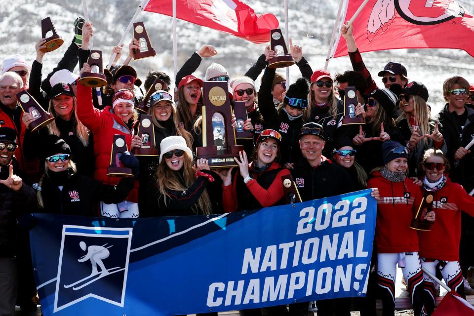 Members of the Utah ski team celebrate their national championship at the NCAA ski championships at Soldier Hollow in Midway on Saturday, March 12, 2022.