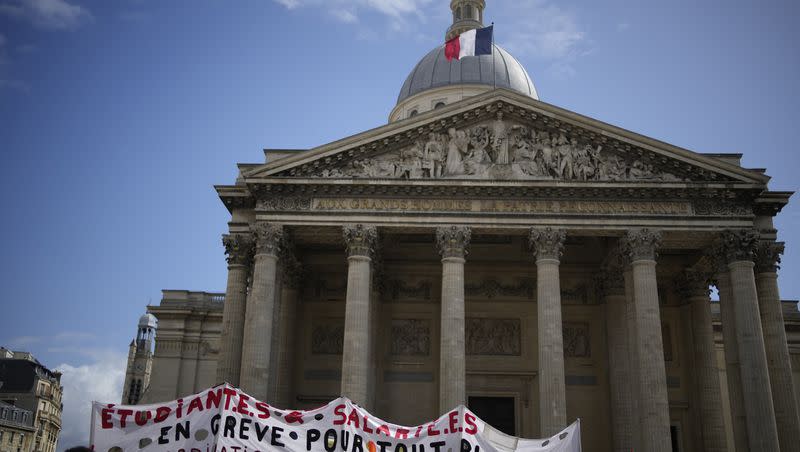 High school students demonstrate outside the Pantheon monument, Thursday, March 30, 2023, in Paris. Young people in France, including some who haven’t even entered the job market yet, are protesting against the government’s push to raise the retirement age.