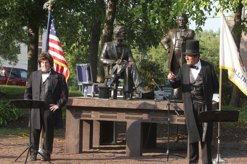 A recreation of the Lincoln-Douglas debates in Freeport, Illinois. From left to right, George Buss and Tim Connors.