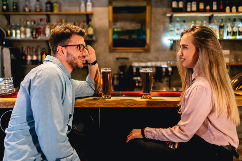 Couple on date in bar (Getty Images)