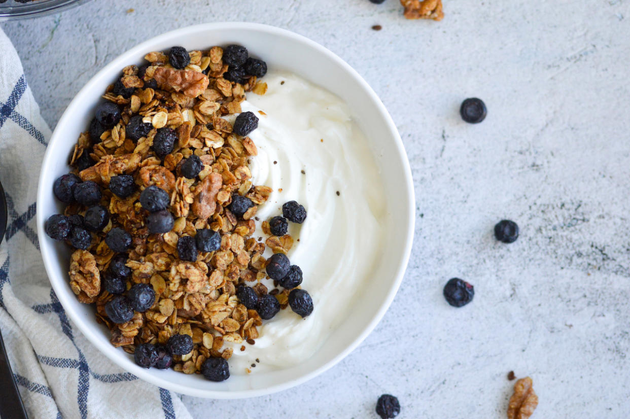 A combination of protein and carbohydrates, like blueberry trail mix and yogurt, makes a smart post-workout snack. (Natalie Rizzo)