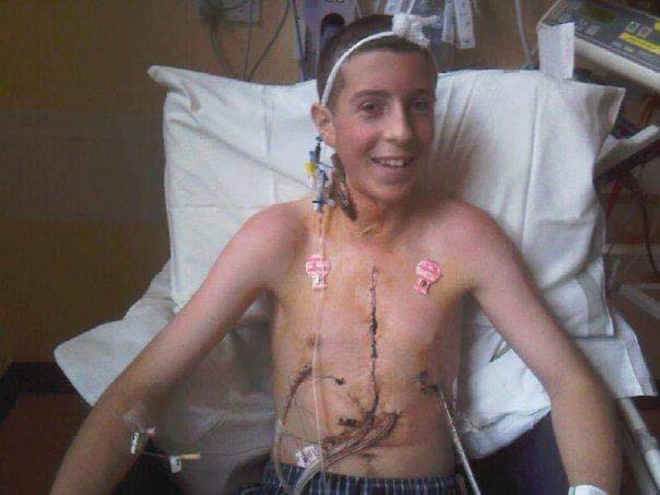 Scott Rutherford in hospital as a teenager. (SWNS)