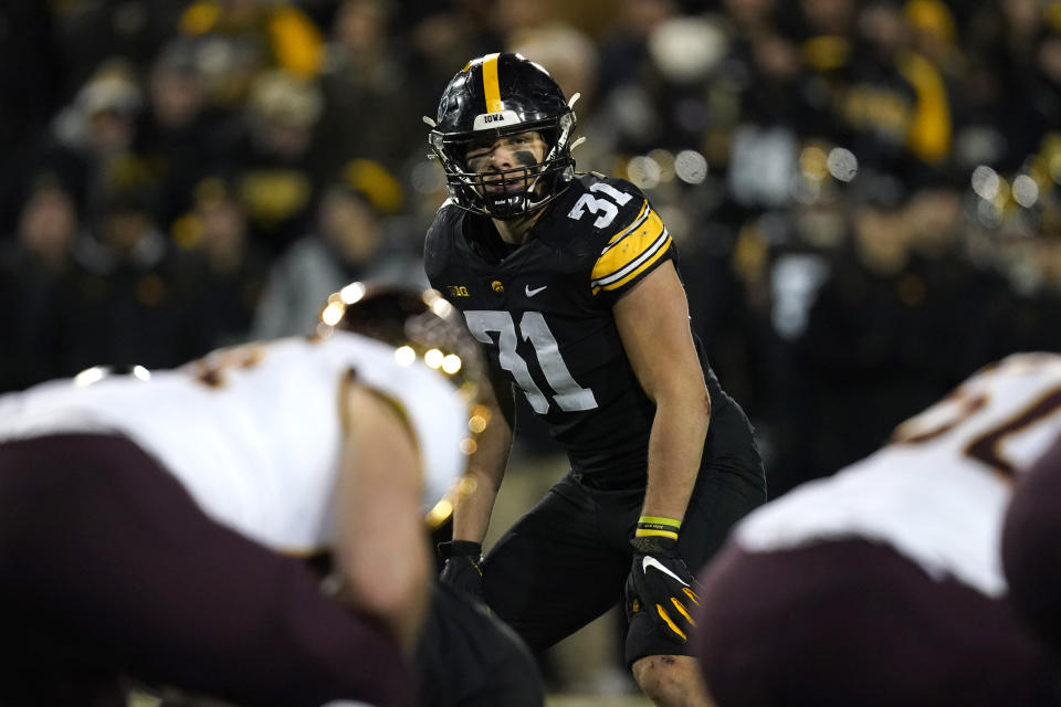 FILE - Iowa linebacker Jack Campbell (31) gets set for a play during the second half of an NCAA college football game against Minnesota, Saturday, Nov. 13, 2021, in Iowa City, Iowa. Campbell was named to the Associated Press preseason All-America team, Monday, Aug. 22, 2022. (AP Photo/Charlie Neibergall, File)