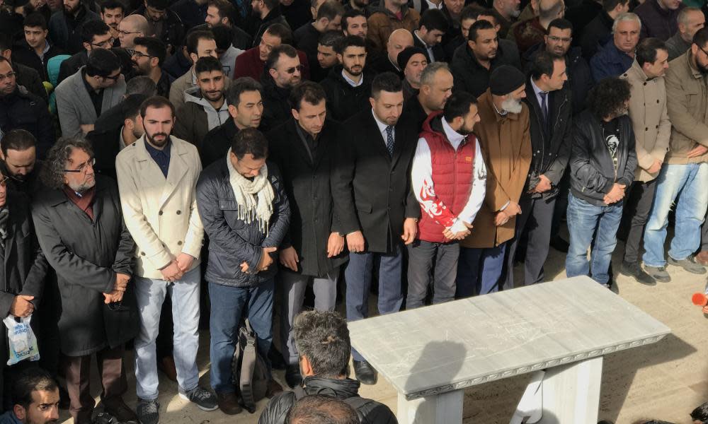 Hundreds of people gather to perform funeral prayers in absentia at the Fatih mosque in Istanbul on Friday