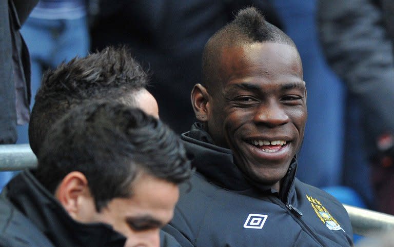 Manchester City's Italian striker Mario Balotelli smiles before the FA Cup third-round match at home to Watford on January 5, 2013. The forward's spell at the Eastlands has been marked by a succession of controversies on and off the pitch