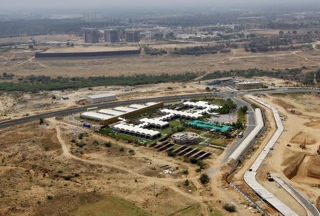 An aerial view of a site under construction at the Gujarat International Finance Tec-City (GIFT) at Gandhinagar, in the western Indian state of Gujarat, April 11, 2015. REUTERS/Amit Dave