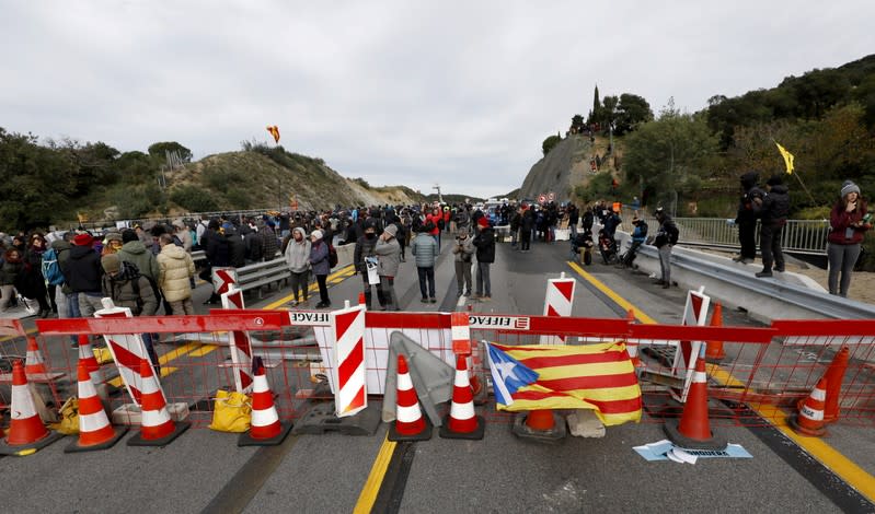 Members of Catalan protest group Democratic Tsunami block AP-7 highway on the French side of the Spanish-French border