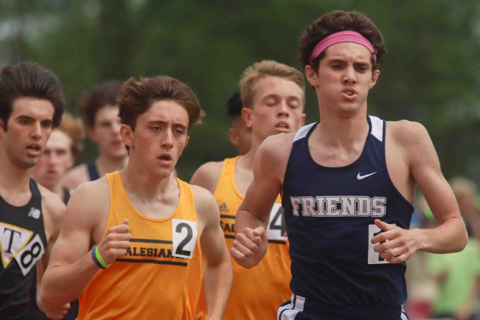 Wilmington Friends' Connor Nisbet takes the lead in the boys 1600-meter run during the New Castle County Track and Field Championships at the Charter School of Wilmington on Saturday, May 12, 2018.