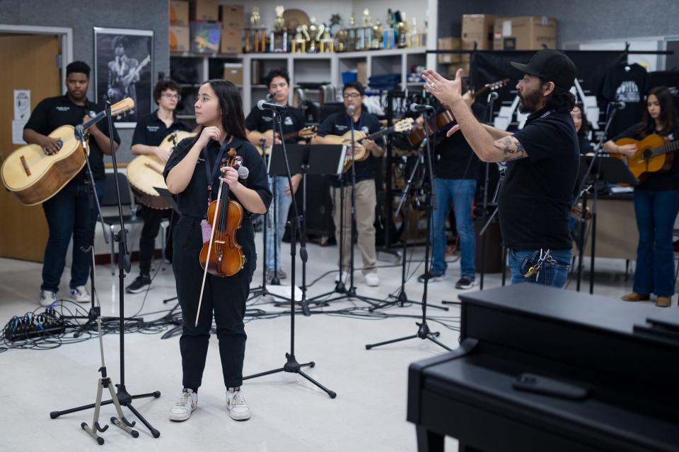 Franklin High School mariachi teacher Mike Hernandez instructs his students at rehearsal on Feb. 15. Mariachi Estrella Del Oeste was one of several El Paso-area high schools that made it to the 2024 UIL State Mariachi Festival.