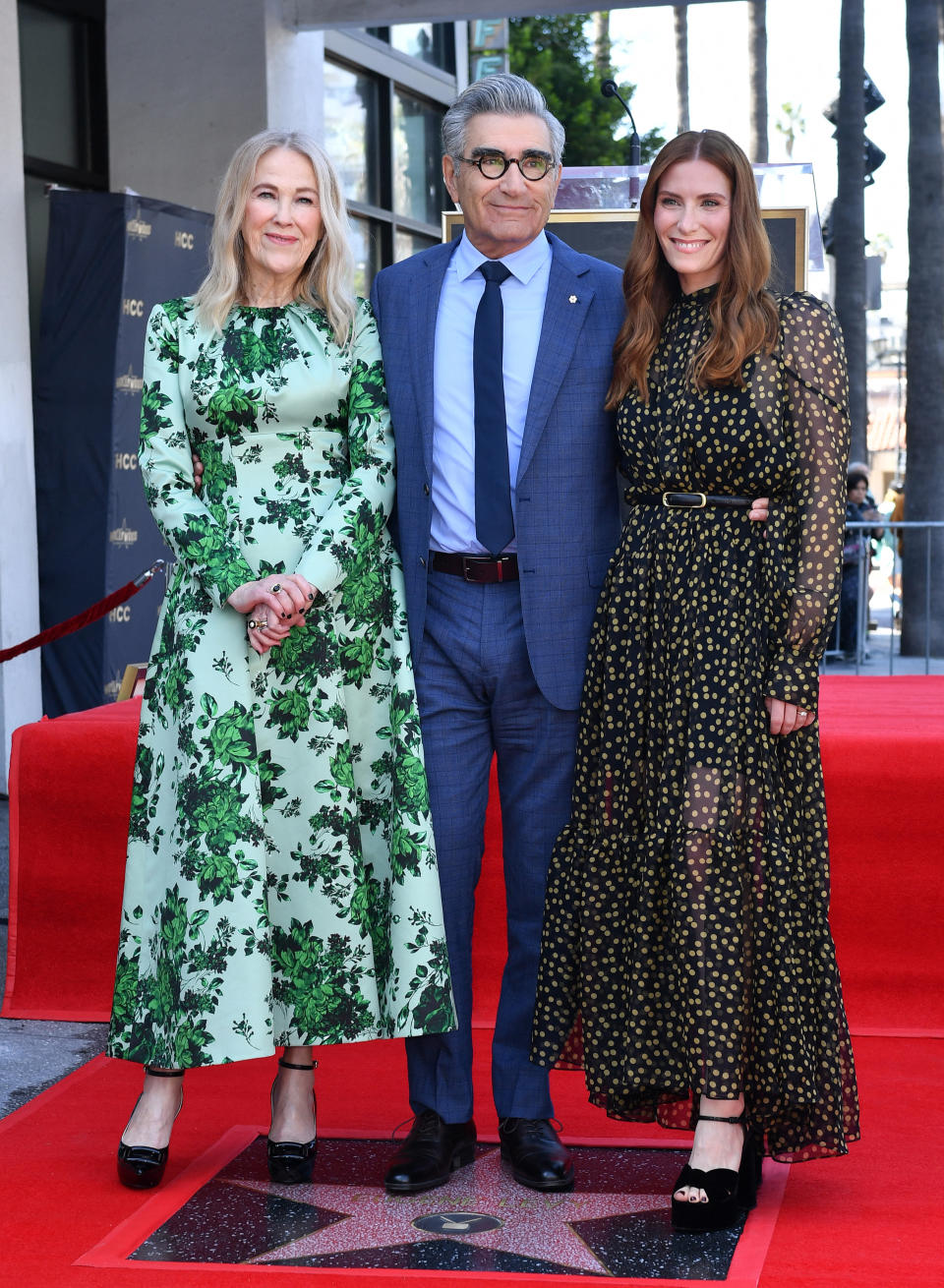 catherine, eugene, and sarah standing by his Hollywood star