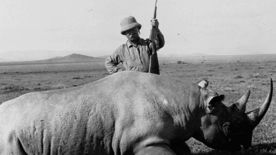 Theodore Roosevelt stands over a rhino he shot while on safari in Africa. Roosevelt went on safari and an extended tour of Africa and Europe immediately after leaving the presidency in 1909. - Library of Congress/Corbis/Getty Images