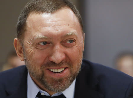 FILE PHOTO: President of En+ Group, Oleg Deripaska attends an agreement signing ceremony with the Krasnoyarsk region's government, in Moscow, Russia December 12, 2017. REUTERS/Sergei Karpukhin/File Photo