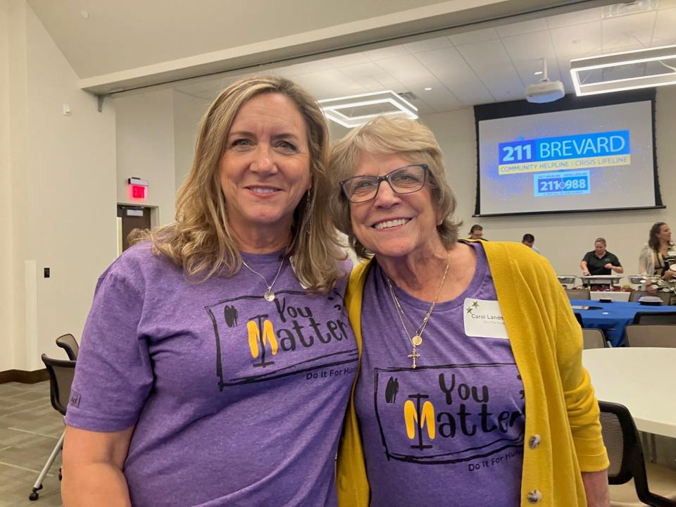 Kelly Haskins of Merritt Island, left, and her mother, Carol Landman, wear "Do It For Hunter" T-shirts. The nonprofit is focused on suicide awareness and prevention and partners with 211 Brevard in promoting knowledge of the 988 hotline emergency number.
