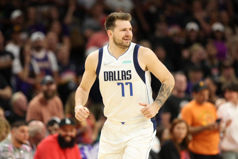 PHOENIX, ARIZONA - MAY 15: Luka Doncic #77 of the Dallas Mavericks reacts during the first quarter against the Phoenix Suns in Game Seven of the 2022 NBA Playoffs Western Conference Semifinals at Footprint Center on May 15, 2022 in Phoenix, Arizona. NOTE TO USER: User expressly acknowledges and agrees that, by downloading and/or using this photograph, User is consenting to the terms and conditions of the Getty Images License Agreement. (Photo by Christian Petersen/Getty Images)