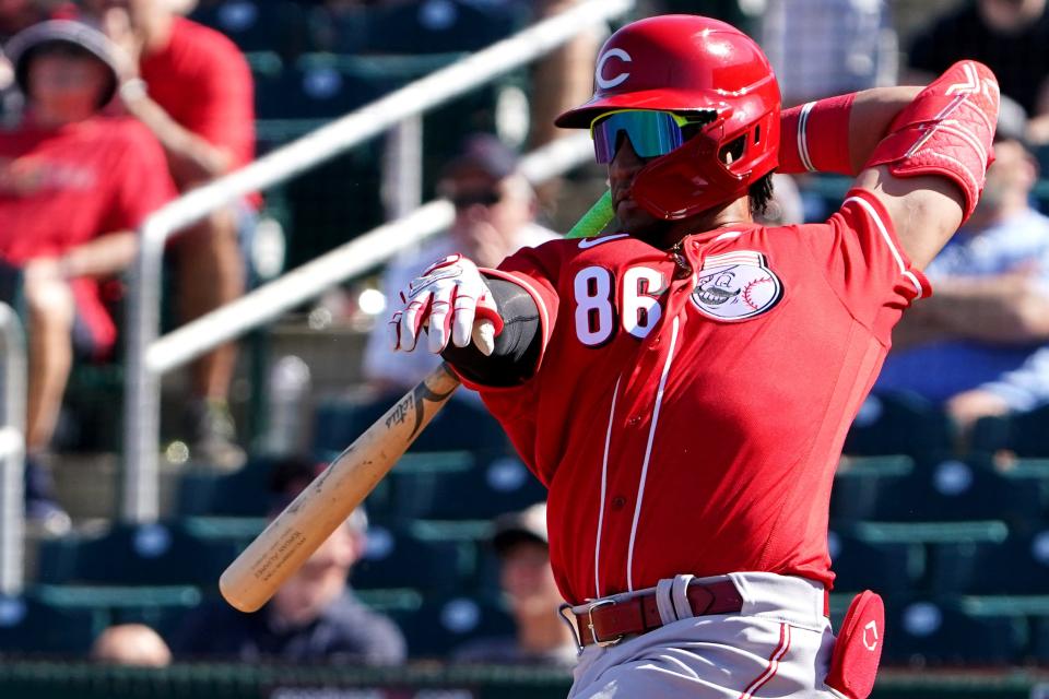 Cincinnati Reds outfielder Allan Cerda (86) corals a wild swing during a spring training baseball game against the Cleveland Guardians, Friday, March 18, 2022, at Goodyear Ballpark Goodyear, Ariz.