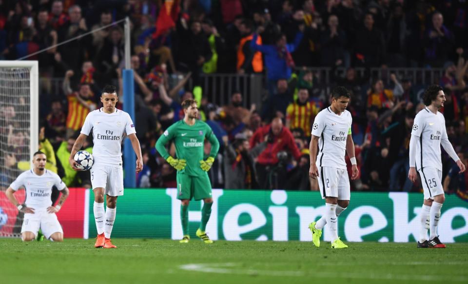 <p>PSG players look dejected as Sergi Roberto of Barcelona scores their sixth goal during the UEFA Champions League Round of 16 second leg match between FC Barcelona and Paris Saint-Germain at Camp Nou on March 8, 2017 in Barcelona, Spain. (Photo by Michael Regan/Getty Images) </p>