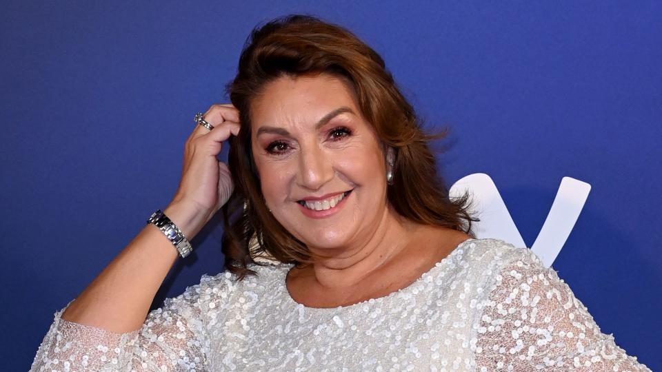 Jane McDonald in a white dress