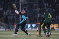 New Zealand's Tim Seifert, left, is bowled out by Pakistan's Usama Mir during the fifth T20 international cricket match between Pakistan and New Zealand, in Lahore, Pakistan, Saturday, April 27, 2024. (AP Photo/K.M. Chaudary)