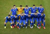 Greece's national soccer players pose before the 2014 World Cup round of 16 game between Costa Rica and Greece at the Pernambuco arena in Recife June 29, 2014. REUTERS/Ruben Sprich