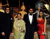 Bollywood actors Amitabh Bachchan, his wife Jaya Bachchan, son Abhishek Bachchan and his daughter-in-law Aishwarya Rai Bachchan arrive the 9th IIFA awards in Bangkok