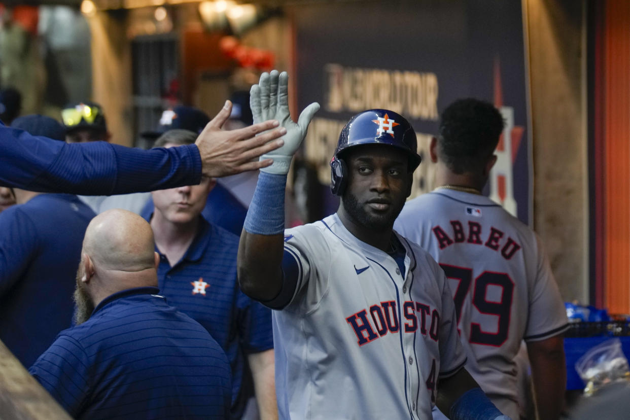 Houston Astros Yordan Alvarez celebrates after hitting a solo home run against the Colorado Rockies during the ninth inning of a baseball game at Alfredo Harp Helu stadium in Mexico City, Saturday, April 27, 2024. (AP Photo/Fernando Llano)