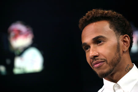 Formula One World Champion, Mercedes' Lewis Hamilton speaks ahead of the United States Grand Prix during an interview with Reuters at the Nasdaq Market Site in New York City, New York, U.S., October 17, 2018. REUTERS/Mike Segar/Files