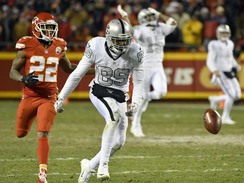 Amari Cooper couldn't come down with this fourth-quarter pass, which appeared to change directions mid-flight. (AP)