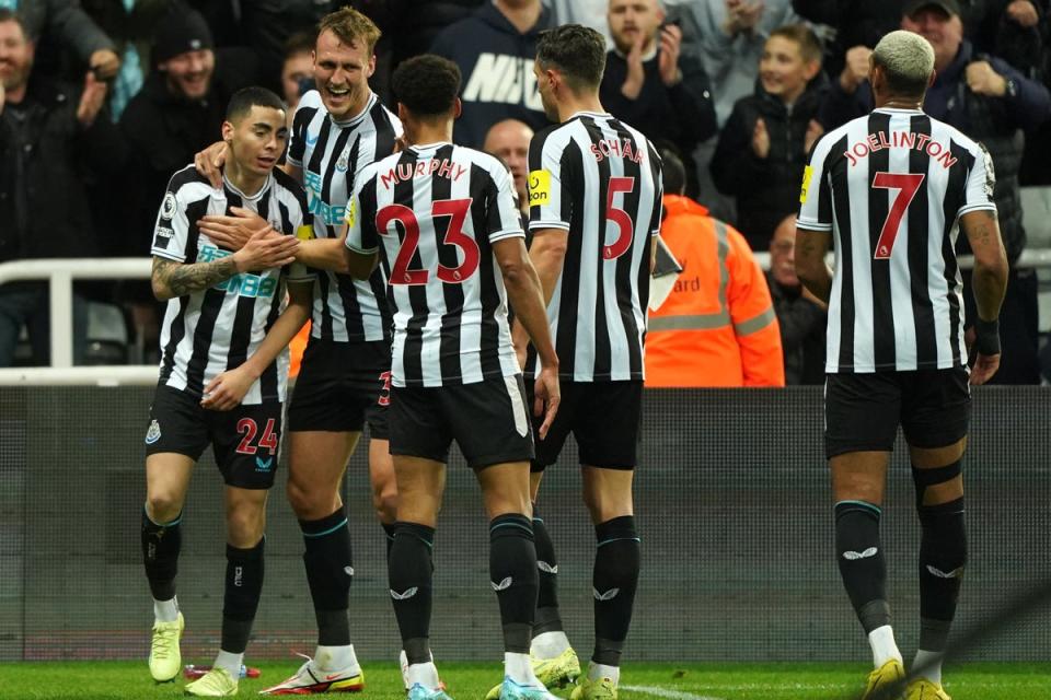 Miguel Almiron (left) celebrates scoring Newcastle’s winner (Owen Humphreys/PA) (PA Wire)