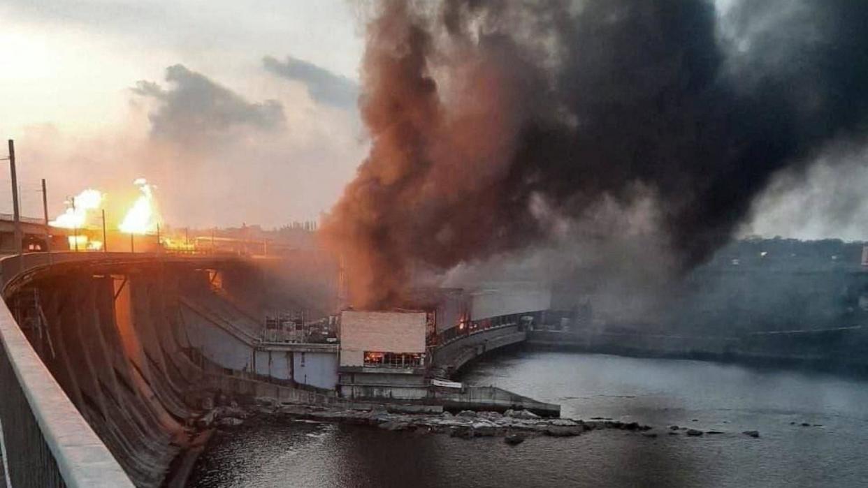 PHOTO: Smoke and fire erupt from an missile explosion on Ukraine's largest dam, the DniproHES, in Zaporizhzhia (Denys Shmyhal/prime Minister Of /via Reuters)