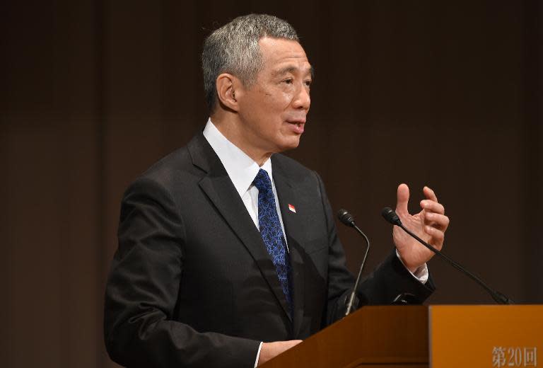 Singapore Prime Minister Lee Hsien Loong delivers a speech during the 20th International Conference on the Future of Asia in Tokyo on May 22, 2014