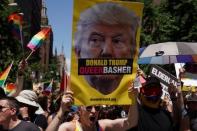 Participants take part in the LGBT Pride March in the Manhattan borough of New York City, U.S., June 25, 2017. REUTERS/Carlo Allegri