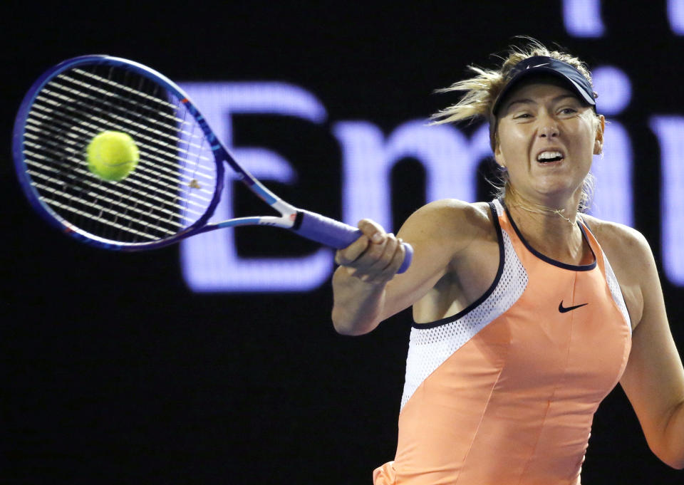 FILE - In this Wednesday, Jan. 20, 2016 file photo, Maria Sharapova of Russia hits a forehand return to Aliaksandra Sasnovich of Belarus during their second round match at the Australian Open tennis championships in Melbourne, Australia. Two-time French Open champion Maria Sharapova has pulled out of the year’s second Grand Slam tournament because of her injured right shoulder. Sharapova announced her withdrawal on Instagram, on Tuesday, May 14, 2019.(AP Photo/Vincent Thian)