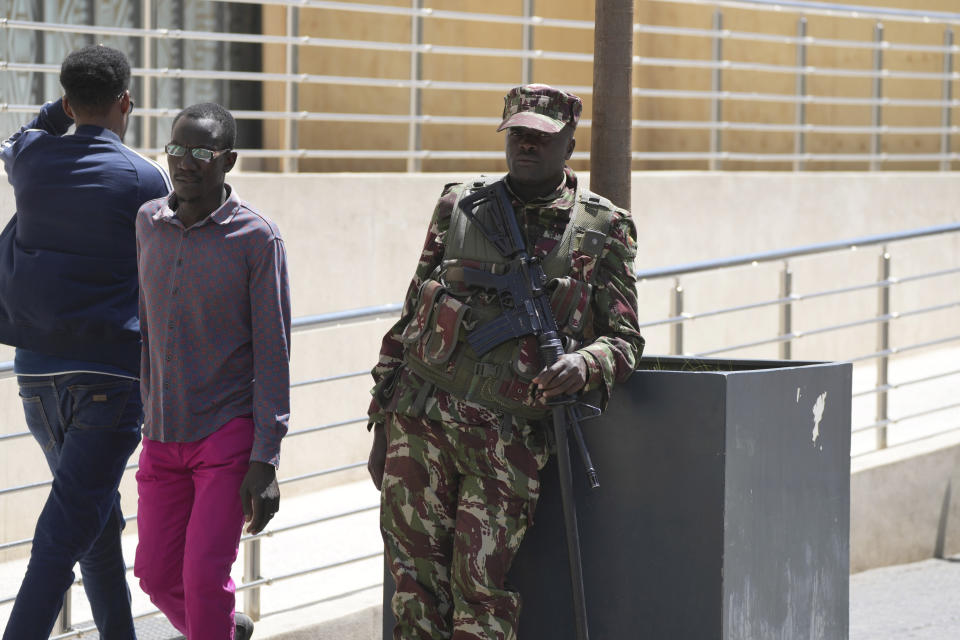 A Kenyan police officer patrols a street in Nairobi, Kenya, Tuesday, March.12, 2024. Kenya agreed in October to lead a U.N.-authorized international police force to Haiti, but the Kenyan High Court in January ruled the plan unconstitutional, in part because of a lack of reciprocal agreements between the two countries. Kenya and Haiti signed agreements Friday, March 1, 2024 to try to salvage a plan for the African country to deploy 1,000 police officers to the troubled Caribbean nation to help combat gang violence that has surged to unprecedented levels. (AP Photo/Brian Inganga)