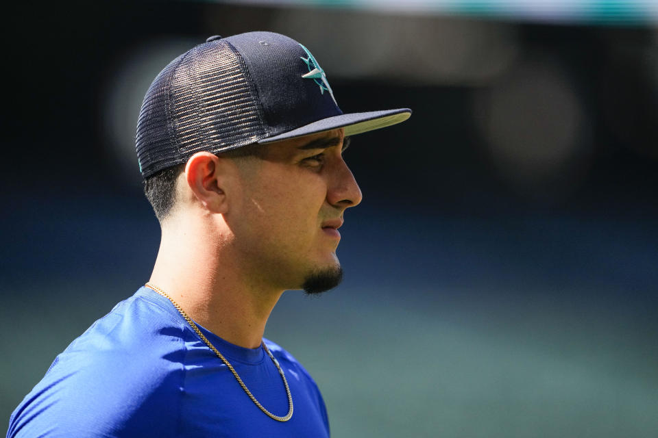 Seattle Mariners' Josh Rojas walks on the field during batting practice before a baseball game against the Boston Red Sox, Tuesday, Aug. 1, 2023, in Seattle. (AP Photo/Lindsey Wasson)
