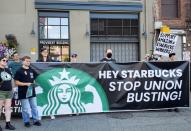 Starbucks employees who support unionization protest ahead of Investor Day, in Seattle