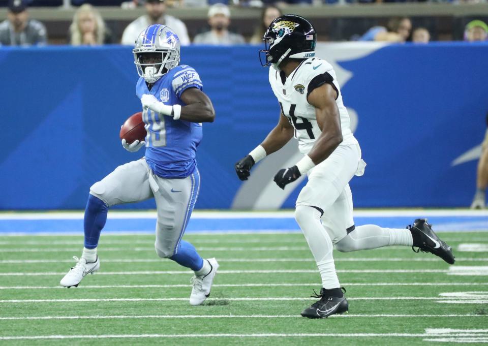 Detroit Lions cornerback Starling Thomas V (49) runs by Jacksonville Jaguars wide receiver Kendric Pryor (14) during the first half of a preseason game at Ford Field, Saturday, August 19, 2023.
