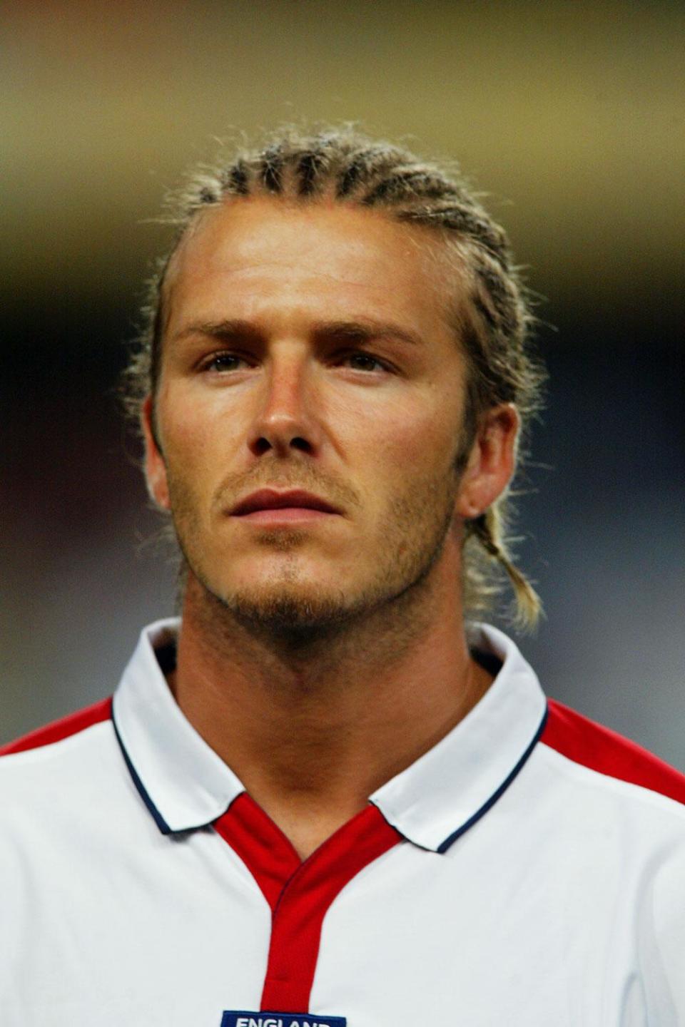 2003: England star David Beckham had his hair in braids (Phil Cole/Getty Images)