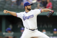 Texas Rangers starting pitcher Jordan Lyles delivers a pitch in the first inning against the Los Angeles Angels during a baseball game on Monday, April 26, 2021, in Arlington, Texas. (AP Photo/Richard W. Rodriguez)