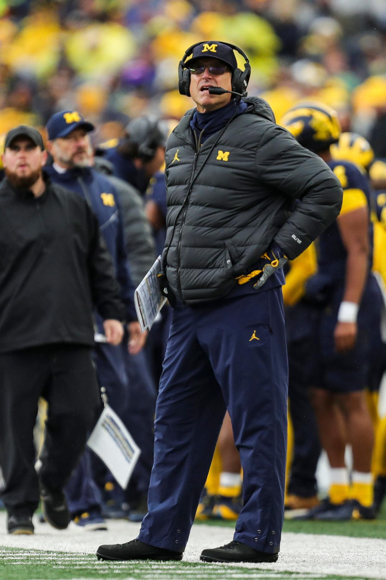 Michigan coach Jim Harbaugh watches a replay against Indiana during the first half of U-M's 52-7 win over Indiana on Saturday, Oct. 14, 2023, in Ann Arbor.